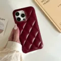 Close-up of quilted wine red leather phone case detail, stylish soft texture surface. - Lattice Wine Red