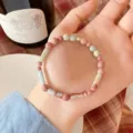 Close-up detail of natural stone and pink crystal beaded bracelet, elegant natural style design. - 5 Shoushan Stone Rhodochrosite Mix