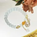 Délicat bracelet en perles de cristal avec pendentif planète et fleur pour les filles. - Forme de Planète / Jaune