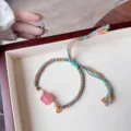 Tibetan ethnic woven pull-string bracelet with pink quartz and beads, sweet and stylish. - Yanyuan Agate