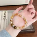 Bracelet en perles de pierres précieuses de citrine et œil-de-tigre avec charme zircon. - Style Anneau Incrusté Lulu Tong