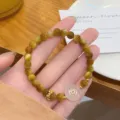 Exquisite yellow crystal tiger eye stone bead bracelet featuring delicate jade flower pendant. - Peace Buckle Style