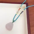 Natural agate laughing buddha pendant necklace with braided rope and decorative beads for women. - 2 Dark Green