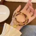 Bracelet double cercle en cristal naturel œil de tigre avec pendentif pièce style ethnique - Œil de Tigre Double Rang