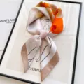 Elegant silk square scarf with chic orange and beige floral line art for women spring autumn styling. - Ginkgo Leaf - Orange White
