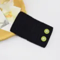 Black knitted ear warmer headband featuring stylish green pearl buttons for women. - Black With Green Button