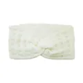 White knitted twist headband with plush lining for winter warmth and cozy ear protection. - Cream