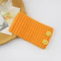Orange knitted headband with pearl buttons, stylish hair accessory for women and daily wear. - Turmeric