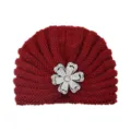 Wine red knitted turban hat featuring a sparkling rhinestone flower brooch for winter warmth. - One Size / Jujube Red