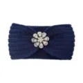 Dark blue knitted headband featuring a sparkling rhinestone flower brooch, warm and stylish. - Navy Blue