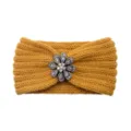 Yellow knitted headband featuring a colorful rhinestone flower, perfect warm winter hair accessory. - Turmeric