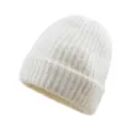 Solid color winter warm knit beanie hat, soft wool-blend fabric, casual cuffed skull cap. - White