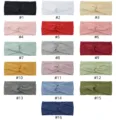 Textured twist yoga headband detail view showing multiple solid color fabric options available. - Multicolor