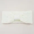 White fleece-lined cable knit bow headband, cozy thermal winter sports ear warmer hair band. - Creamy White