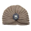 Detailed view of brown knitted turban hat featuring a sparkling dark blue crystal brooch centerpiece. - One Size / Khaki