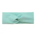 Mint green twisted sports headband for yoga, workout, and face washing, stretchy fabric. - Light Green