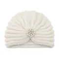 White knitted turban hat for women, stylish winter warm beanie with elegant pearl brooch. - One Size / Cream