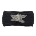 Black knitted headband featuring a sparkling beaded floral detail for warmth and style. - Black