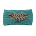 Handmade knitted headband with beaded leaf embellishment, warm winter hair accessory. - Post Green