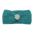 Dark teal knitted headband featuring a sparkling crystal flower brooch for winter warmth. - Post Green