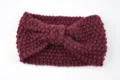 Burgundy knitted bow headband for women, soft winter warm hair accessory, stylish solid color. - Fuschia