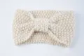 Beige knitted headband, cozy cable knit ear warmer and stylish hair accessory for winter. - Meter