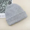 Solid color knitted beanie cap for men and women, warm winter pullover hat in gray color. - Light Gray