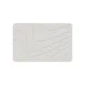 Close-up detail of the modern minimalist diatomaceous earth bath mat with soft wave texture. - Stripe Style 4