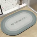 Absorberende ovale badmat met grijs verloopdesign en tekst voor moderne vloerdecoratie. - Groen Verloop Ovaal