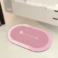Roze ovale diatomeeënaarde badmat, absorberende en antislip vloermat voor thuisgebruik. - Zoete Roze Ovaal