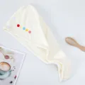 Thickened coral fleece dry hair cap in beige with cute colorful dots and buttons for fast drying. - Beige