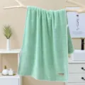 Solid color soft absorbent coral fleece bath towel with simple label for home bathroom use. - 70*140cm / Turquoise