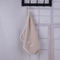 Solid color coral fleece hanging towel, soft and absorbent facial towel for daily use. - Coffee
