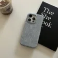 Detailed view of grey denim texture phone case for iPhone, stylish minimalist design style. - Light Blue / iPhone 11