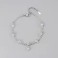 Silbernes Kleeblatt Zirkon Armband Detailansicht, elegantes modisches Damenschmuck Armband. - Weißgold