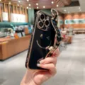 Luxury black electroplated iPhone case with cute smile pattern and matching wrist strap. - iPhone 14 Pro Max / Classic Black
