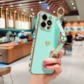 Ηλεκτρολυτική θήκη iPhone σε πράσινες αποχρώσεις με μοτίβο καρδιάς και λουράκι καρπού. - Πράσινο της μέντας / iPhone 14 Pro Max