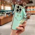Coque pour iPhone vert menthe galvanisée avec joli design souriant et lanière assortie. - iPhone 14 Pro Max / Vert menthe