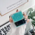 Transparentes Glitzer-Handyhülle Detail mit funkelnden blauen Pailletten und Schutz. - Grün