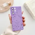Close-up detail of the starry splatter magnetic phone case featuring camera protection and ring. - Purple / Samsung S23