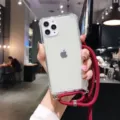 Clear anti-drop phone case with red crossbody lanyard, four corner protection design for smartphone. - Splash Red / iPhone14