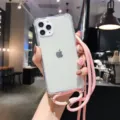 Clear transparent phone case with cute pink lanyard strap, durable shockproof protection. - Pink / iPhone14
