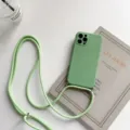 Green silicone lanyard phone case with adjustable strap, soft TPU bumper and precise cutouts. - Matcha Green / iPhone 13