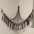 Black macrame toy hammock corner net with red and green ribbons for kids room storage - Black Christmas Elements