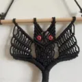 Handmade macrame bat wall hanging with red eyes, cute Halloween gothic room decor tapestry. - Style 1