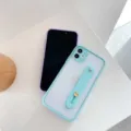 Detailed view of silicone phone case with strap stand, smooth texture and lens protection. - Light Green + Wriststrap / IP12 mini