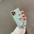 Detailed showcase of mint green phone case featuring elegant pearl chain strap accessories. - Back Cover / Double Row Pearls (Wrist Strap Accessory) / Electroplated Mint Green