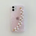 Pink pearl bracelet phone case with shell texture acrylic design compatible with iPhone. - Bracelet Style / iphone13promax / Pink