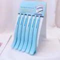 Detail shot of light blue non-crease duckbill hair clips with silicone pad for styling. - 6 Pieces/Pack / Blue
