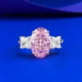 Close-up detail shot of sparkling oval pink ice flower cut ring in S925 silver style - Size 5 / Pink